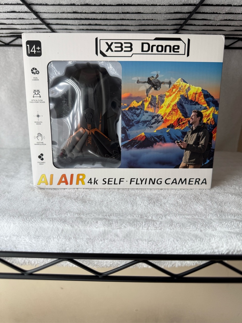 AI AIR 4K Self-Flying Camera - Black and Orange DRONE